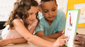 Children looking at book