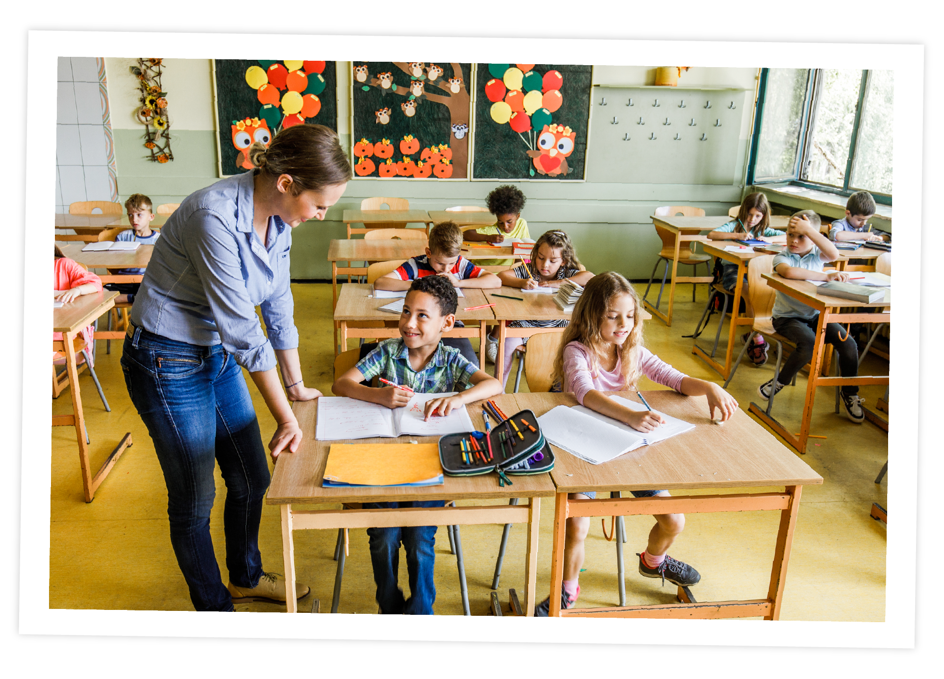 Teacher with students in classroom