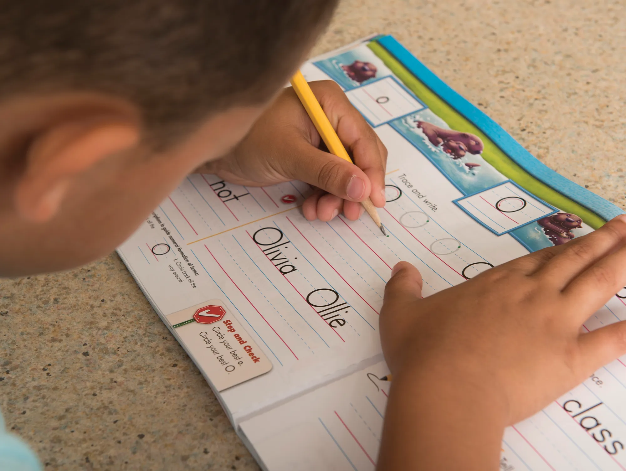  Student practicing handwriting in a Student Edition